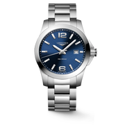 Quadrante nero con indici e numeri arabi luminosi, datario a finestrella a ore 3 e lancette luminescenti del Longines Conquest 8